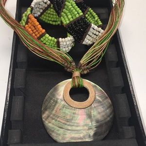 3 piece set: necklace, and two beaded bracelets.